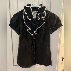 Ruffled black blouse